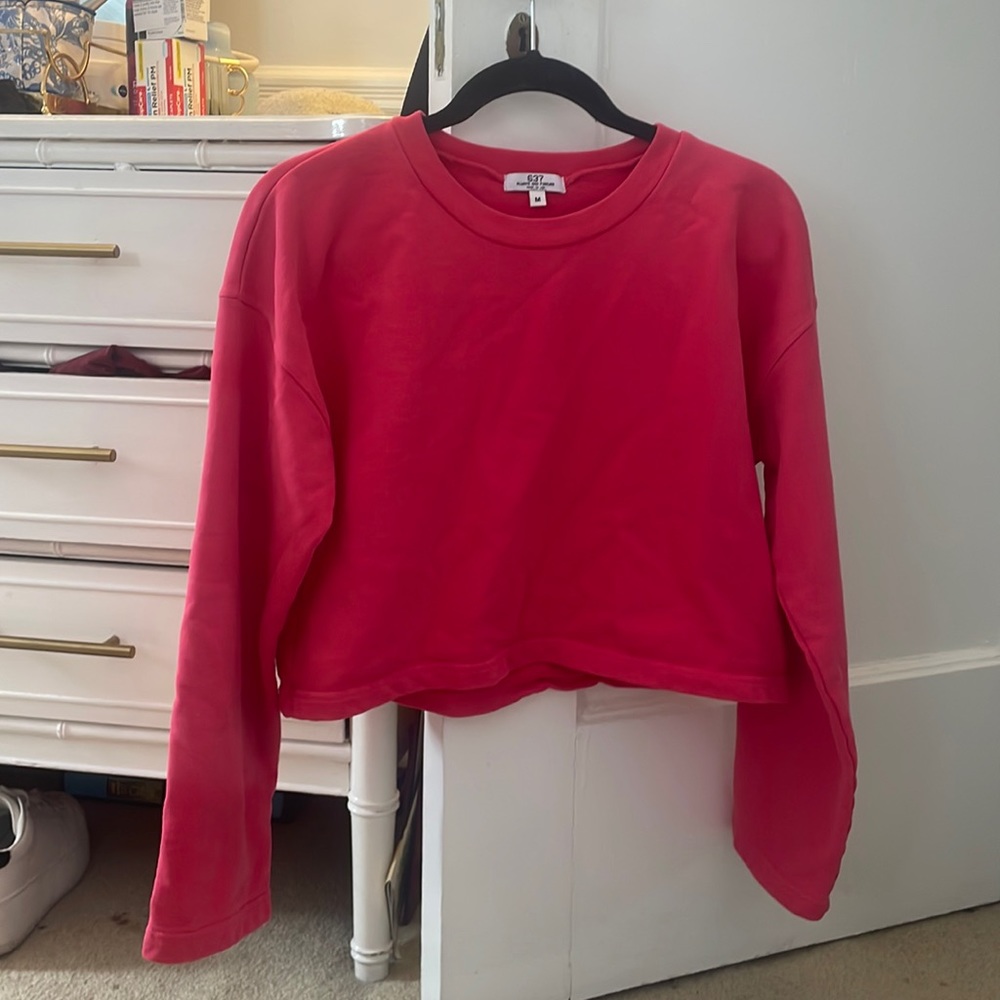 Hot pink cropped CRW beck sweatshirt by 673 (revolve)